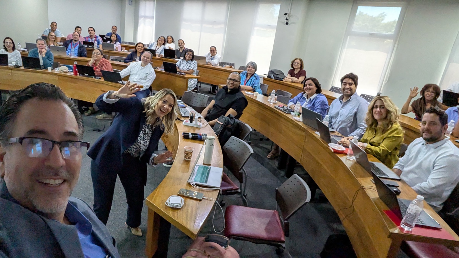 Yane teaching a packed amphitheater classroom in the Dominican Republic